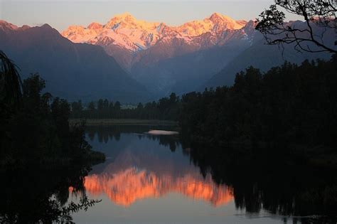 New Zealand Lake Matheson And The Southern Alps At Sunset Fotoeins