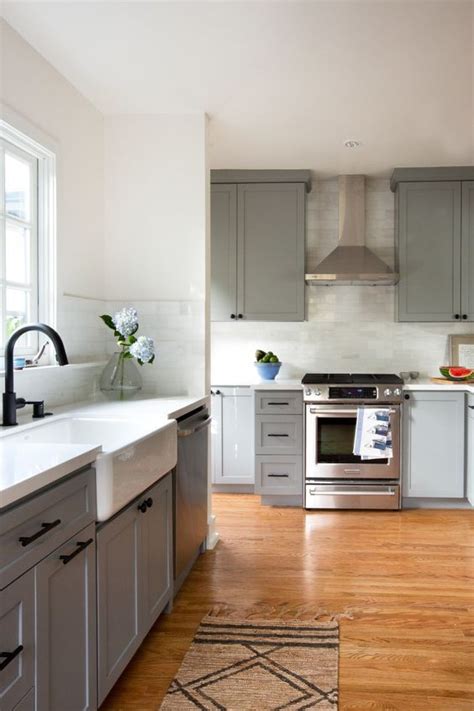 White kitchen cabinets complement a multitude of decorating styles that are sure to match your design tastes. Chelsea gray, Cabinets and Chelsea on Pinterest