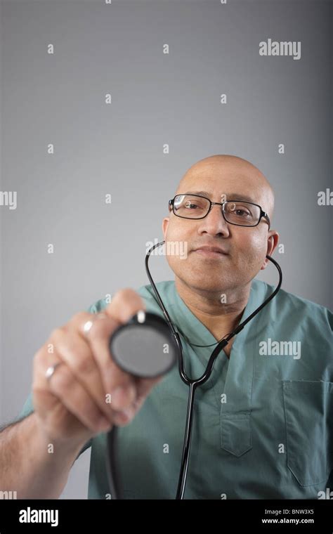 Doctor Holding His Stethoscope Stock Photo Alamy