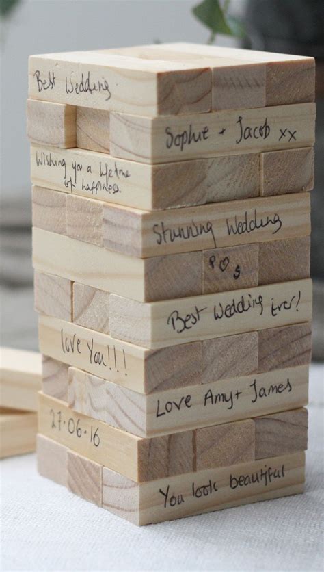 Ask Guests To Sign A Jenga Piece As An Alternative Wedding Guest Book