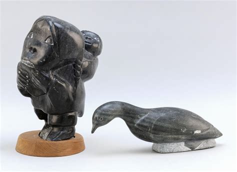 Lot Two Inuit Eskimo Soapstone Carvings Woman With Papoose On Wood Base Carved Of Black