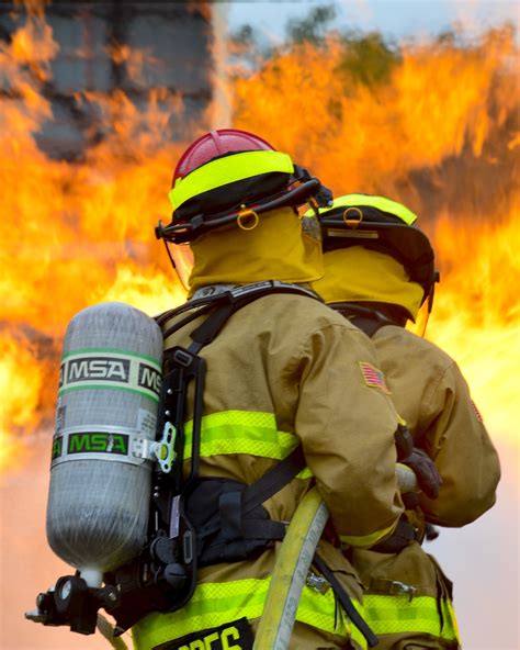 720x1280 Wallpaper Firefighters Fire Training Portrait