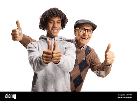 Happy African American Guy And A Caucasian Elderly Man Gesturing Thumbs
