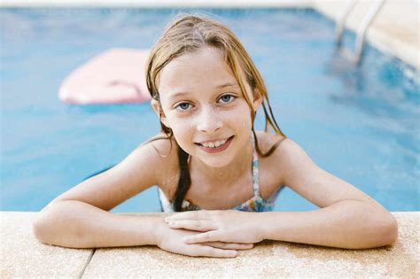 Smiling Girl At Poolside Stock Photo