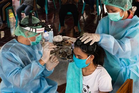 Baliindonesia Dec 3 2020 Two Volunteer Doctors Doing Ear Examinations