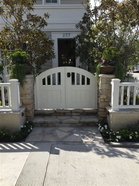 Custom Wood Double Gate By Garden Passages Featuring Wooden Picketing