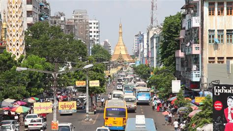 The city is located at the centre of the naypyidaw union territory. YANGON, MYANMAR - APRIL 28: Yangon Street Activity On April 28, 2012 In Yangon. Yangon Is The ...