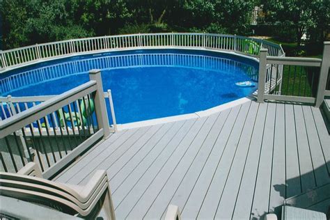 Above ground deck around pool. Round above ground composite pool with decks railing ...