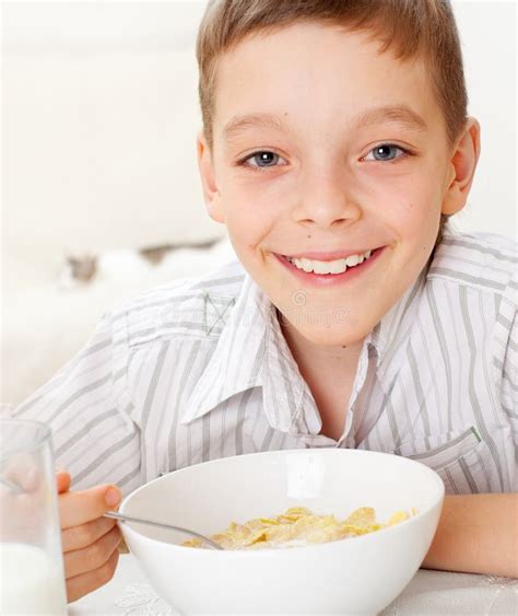 Boy Eating Breakfast Stock Photo Image Of Eating Flakes 24643566