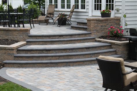 Multi Level Patio With Walls And Bull Nose Pavers Using Techo Bloc