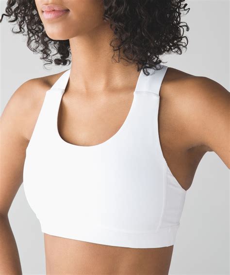 Many women wear sports bras to reduce pain and physical discomfort caused by breast movement during exercise. Lululemon All Sport Bra III - White - lulu fanatics