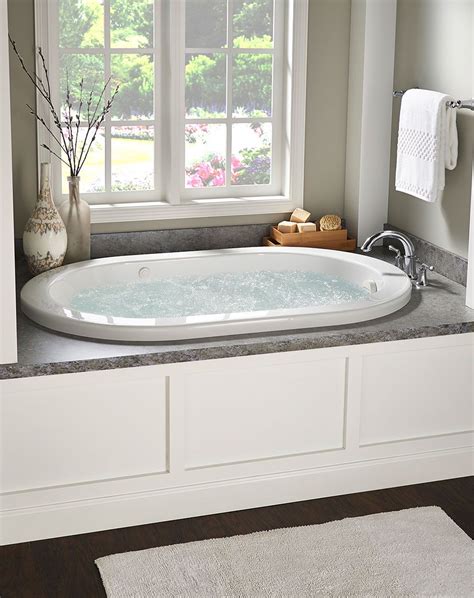 Enjoy A Soothing Soak In This Ridgefield Whirlpool This Soaker Tub Features A 19 Soaking Depth