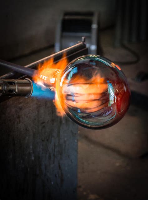 Creation At The Glass Blowers Bench Photograph By Rob Travis Pixels
