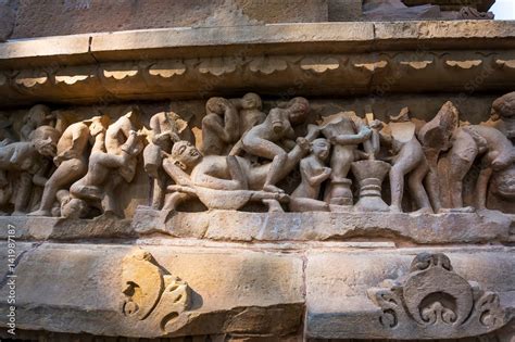 sculptures depicting people having sex on the walls of ancient temples of kama sutra in india