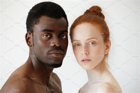 Black And White Headshot Of African Man And Caucasian Woman Standing People Images ~ Creative