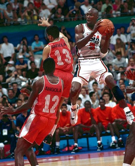 Michael Jordan Contorts In Air To Get A Shot Off Against Angola In Team