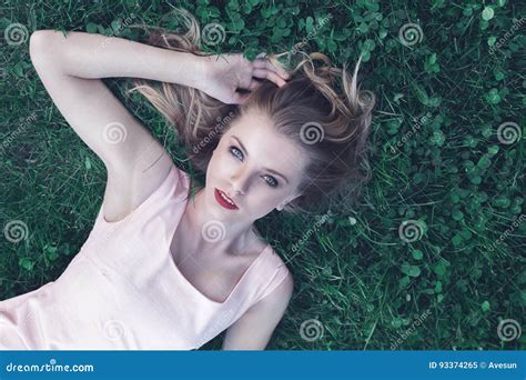Young Woman Lying Down On Grass Stock Image Image Of Park Hair 93374265