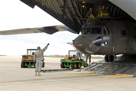 C 17 Globemaster Iii Delivers Ch 47 Chinook Helicopter Back From