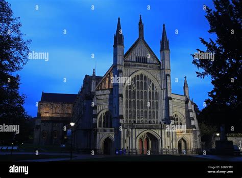 Winchester Cathedral At Night Stock Photo Alamy