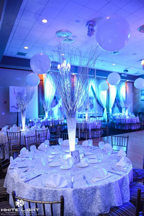 Perfect backdrop for the current weather :) winter wonderland themed photo booth and table decorations for shopping bazaar. Winter Wonderland theme party with Birch Tree centerpieces ...