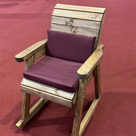 The material used to create outdoor rocking chairs include resin, wicker, woods, and metal. Wooden Garden Rocking Chair with Burgundy Cushions ...