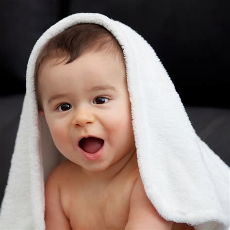 Premium Photo Adorable Baby Covered With A Towel