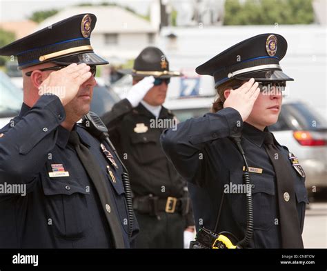 Officers Salute During Funeral For Austin Police Officer Jaime Padron Who Was Killed In The