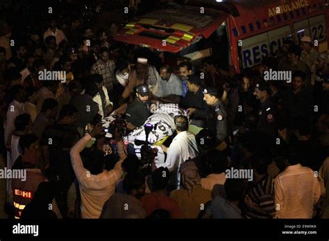 Pakistani relatives mourns over the death of their loved ones at a