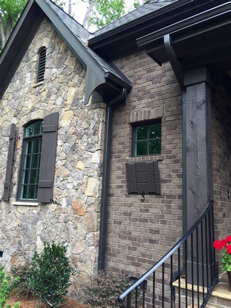 Shutters on a stone house. ARH Asheville 1131F Plan (Exterior 40) Stone: Oakridge ...