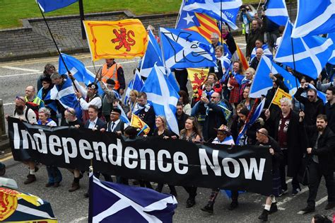 scottish independence campaigners filmed marching through glasgow in their thousands as they