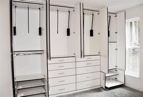 The pull down closet rod makes it easy for wheelchair users to reach clothing items in the closet because it lowers them to the chair. Deluxe Custom Wardrobe in White - Incredible Closets in ...