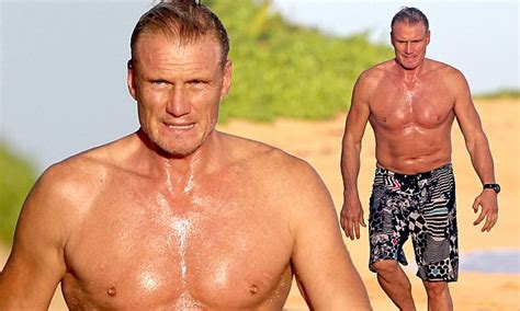 Dolph Lundgren Shows Off His Muscular Arms And Rippling Abs In Hawaii