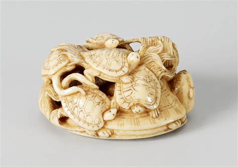 a small ivory netsuke of eight minogame second half 19th century lot 924