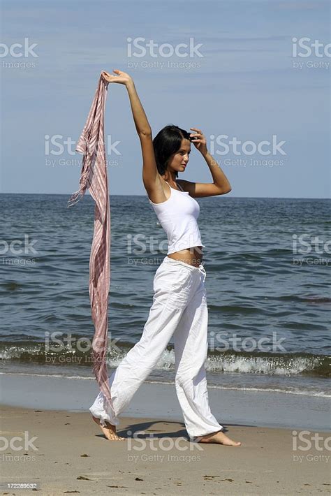 Woman On A Beach With Towel Stock Photo Download Image Now Adult