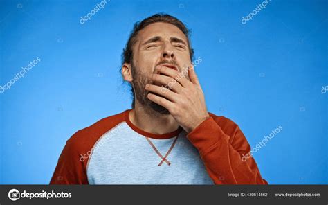Sleepy Man Closed Eyes Yawning Covering Mouth Blue — Stock Photo