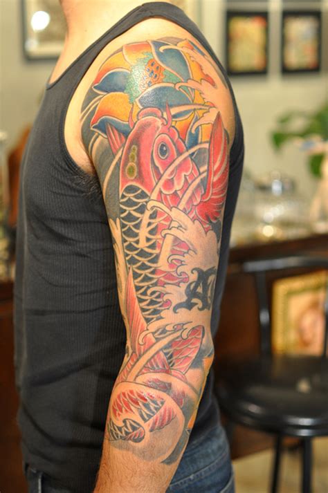 The koi fish is one of the iconic symbols in japanese culture. Best japanese koi fish tattoo on arm - Tattoos Book - 65 ...