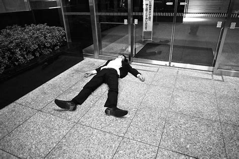Passed Out Salaryman On The Street In Tokyo Japan Drew Brown