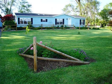 With split rail fencing, you are easily able to install your fence yourself with no help from contractors, friends, or family. split rail fence flower bed - Google Search | Driveway ...