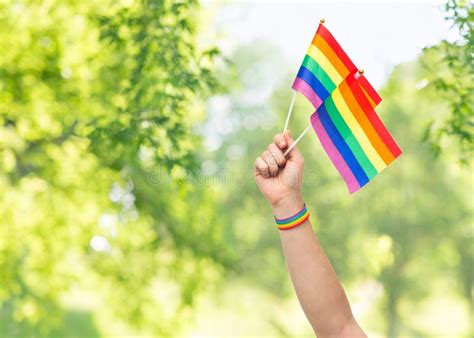hand with gay pride rainbow flags and wristband stock image image of masculine symbol 149883029