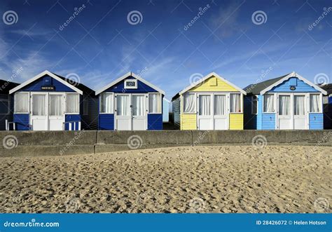 Row Of Brightly Coloured Beach Huts Stock Photo Image Of Channel