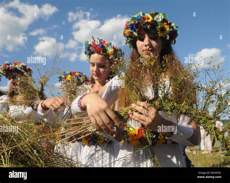 kiev ukraine 6th july 2019 women weave wreaths of wild flowers during a celebration in kiev