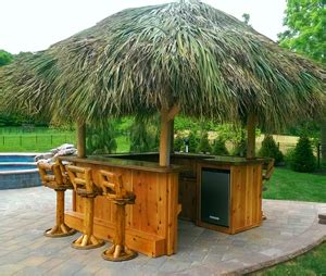 Our portable tiki bars easily turn any backyard into a tiki party! Tiki Huts - Backyard Tropical Hut - Custom-Built, Thatched ...