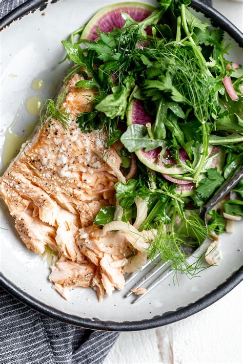 Olive Oil Slow Poached Salmon With Fennel And Lemon Arugula Herb Salad