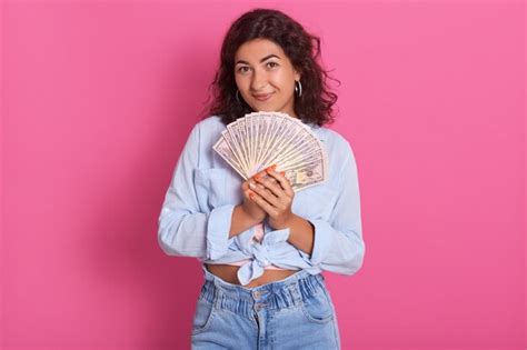 Premium Photo Closeup Portrait Of Young Woman Holding Bunch Of Money