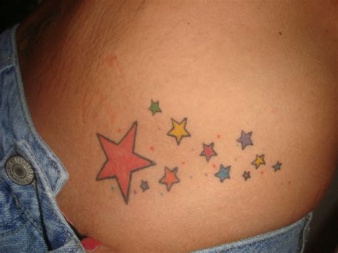 Shooting star tattoo design examples for women and girls. Multi Colored Shooting Stars Tattoo Picture
