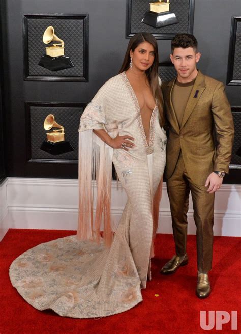 Photo Priyanka Chopra Jonas And Nick Jonas Arrive For The 62nd Annual