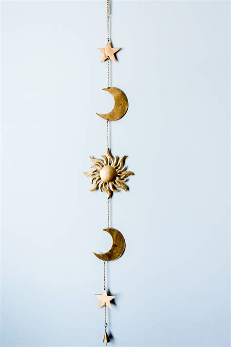 Ceiling hanging home decor items will certainly have guests looking up at your ceiling in pure amazement. Sun Moon and Stars Wall Hanging Decor