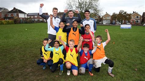 Under 23s Duo Join Community Football Camp