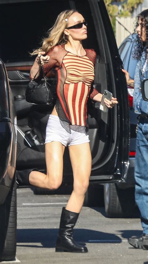 Lily Rose Depp Pairs Tiny Shorts With Big Boots On Lunch Date Vogue