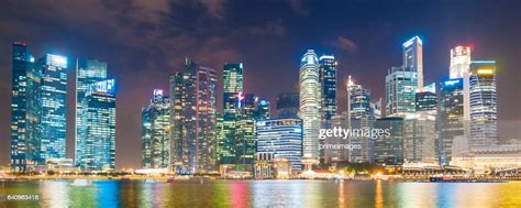 Panoramic View Of The Singapore Skyline At Dusk High Res Stock Photo